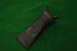 Reproduction bronze axe head.