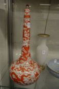 A large Chinese iron red and white porcelain lidded bottle vase.