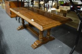 A refectory style coffee table.