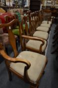 A set of six mahogany dining chairs, two with arms.