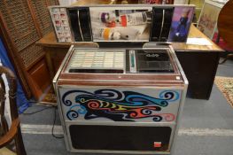 A Rock-Ola juke box.