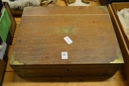 A brass bound oak box.