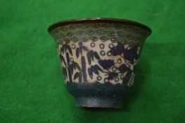 A small cloisonne bowl.