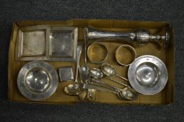 A small collection of silver items.