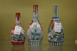 Three small Kutani vases.