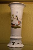 A Continental porcelain vase decorated with birds.
