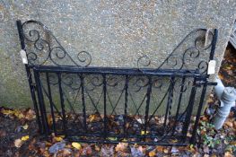 A pair of wrought iron driveway gates.
