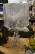 A stylish perspex table lamp together with another lamp.