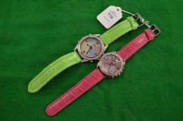 Two decorative large wristwatches.