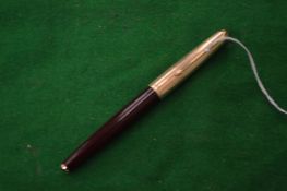 A Parker 61 fountain pen.