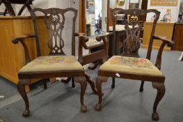 A good pair of Chippendale style carved mahogany armchairs with drop-in seats on cabriole legs