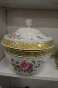Floral decorated large porcelain bowl and cover.