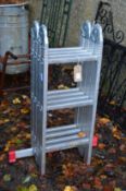 A folding aluminium ladder.