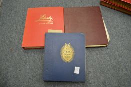 Three stamp albums and contents.