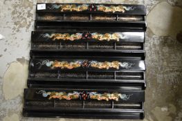 A set of four Chinese lacquer mahjong stands.