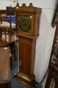 A 19th century oak cased 30 hour clock with brass dial (case cut down).