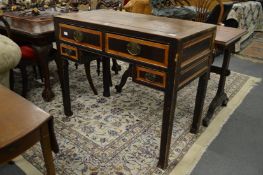 A early Chinese softwood desk with two frieze drawers, two smaller drawers on square legs.