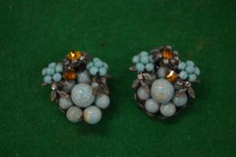 Designer earrings signed Damario, New York.