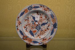 An Imari plate.