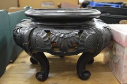 A Chinese carved wood stand.