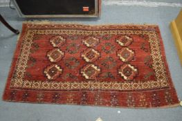 A small Tekke Bokhara rug 150cm x 90cm.