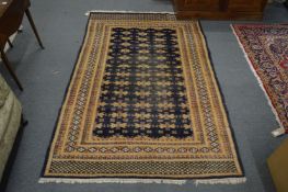 A Bokhara style rug 200cm x 128cm.