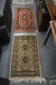 Two small Persian style rugs 100cm x 60cm and 110 x 60cm.