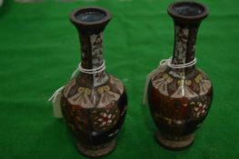 A pair of miniature cloisonne vases.