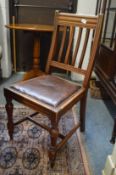 A set of six Victorian walnut dining chairs.