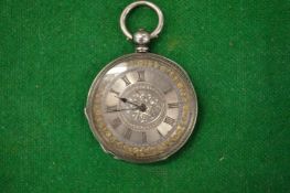 A ladies' silver pocket watch with engraved dial.