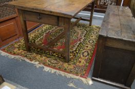 A Persian style rug (worn) 185cm x 140cm.