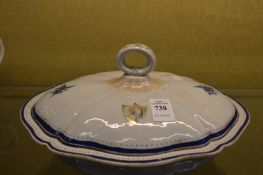 An armorial tureen and cover.