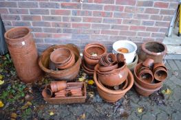 A large quantity of terracotta and other garden pots etc.