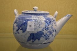 Blue and white teapot.