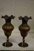 A pair of Indian enamel brass vases.