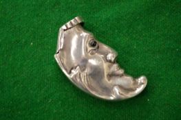 A man in the moon vesta case.