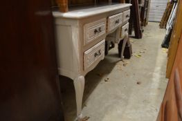 A French style grey painted kneehole dressing table or desk.