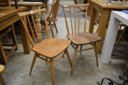 A pair of Ercol kitchen chairs.