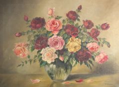 R. Schwetter (Early 20th Century) A still life of mixed roses in a glass vase, oil on canvas,