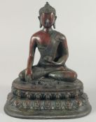 A GOOD LARGE BRONZE BUDDHA, seated upon a lotus base, 29.5cm high.