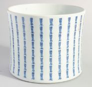 A LARGE CHINESE BLUE AND WHITE PORCELAIN BRUSH POT, with columns of characters, 17cm high.