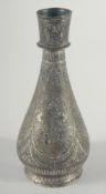 A SMALL ISLAMIC ENGRAVED METAL HUQQA BASE, with floral decoration, 15cm high.