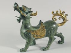 A LARGE METAL FIGURE OF A MYTHOLOGICAL BEAST, 35cm long.