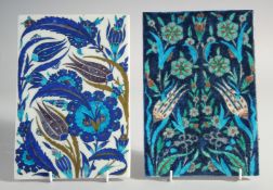 TWO IZNIK STYLE GLAZED POTTERY TILES, each 24cm x 16.5cm.