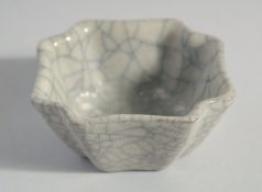 A SMALL CHINESE CRACKLE GLAZE BRUSH WASH, 9cm at widest point.