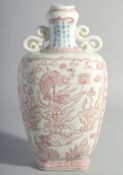 A CHINESE UNDERGLAZE RED TWIN HANDLE FLASK VASE, decorated with fish and aquatic flora, inscribed to