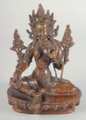 A BRONZE FIGURE OF A SEATED DEITY, on an oval form base, 16.5cm high.