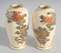 A SMALL PAIR OF JAPANESE SATSUMA VASES, decorated with flora and gilt highlights, character mark