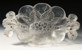 A MUGHAL INDIAN CARVED ROCK CRYSTAL CUP, with floral twin handles and carved flower motif to the