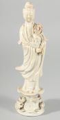 A CHINESE BLANC-DE-CHINE FIGURE OF GUANYIN, 26.5cm high.